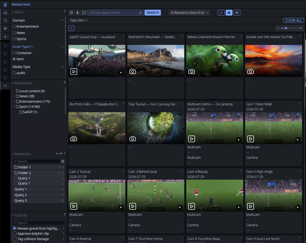The Synaxis media library: domain and media-type filters with workspace folders on the left, and a grid of video, image and multi-camera assets with automatically generated proxies